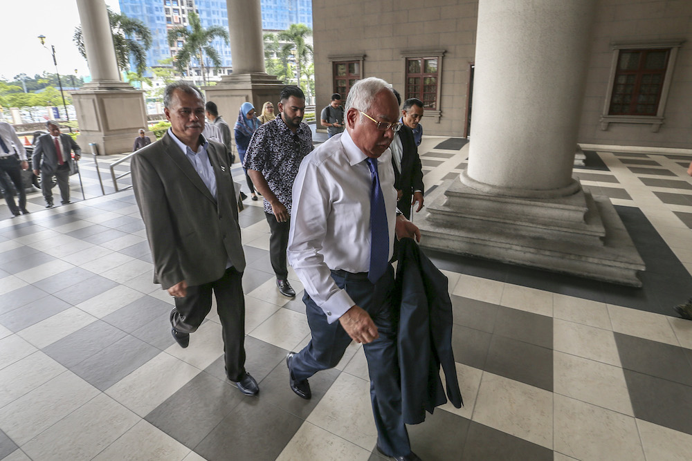 Former prime minister Datuk Seri Najib Razak arrives at the Kuala Lumpur High Court July 15, 2019. u00e2u20acu201d Picture by Firdaus Latif