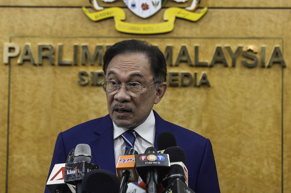 Port Dickson MP Datuk Seri Anwar Ibrahim speaks to reporters in Parliament July 16, 2019. u00e2u20acu201d Picture by Miera Zulyana