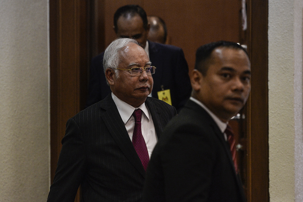 Datuk Seri Najib Razak is seen at the Kuala Lumpur Courts Complex July 17, 2019. — Picture by Miera Zulyana