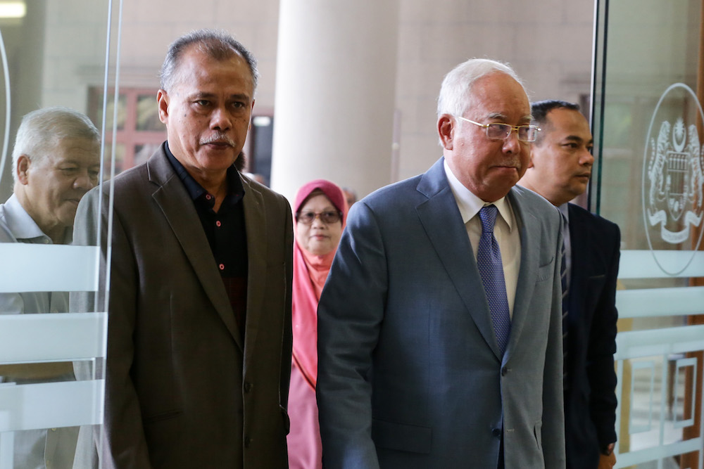 Former prime minister Datuk Seri Najib Razak arrives at the Kuala Lumpur High Court July 18, 2019. u00e2u20acu201d Picture by Ahmad Zamzahuri