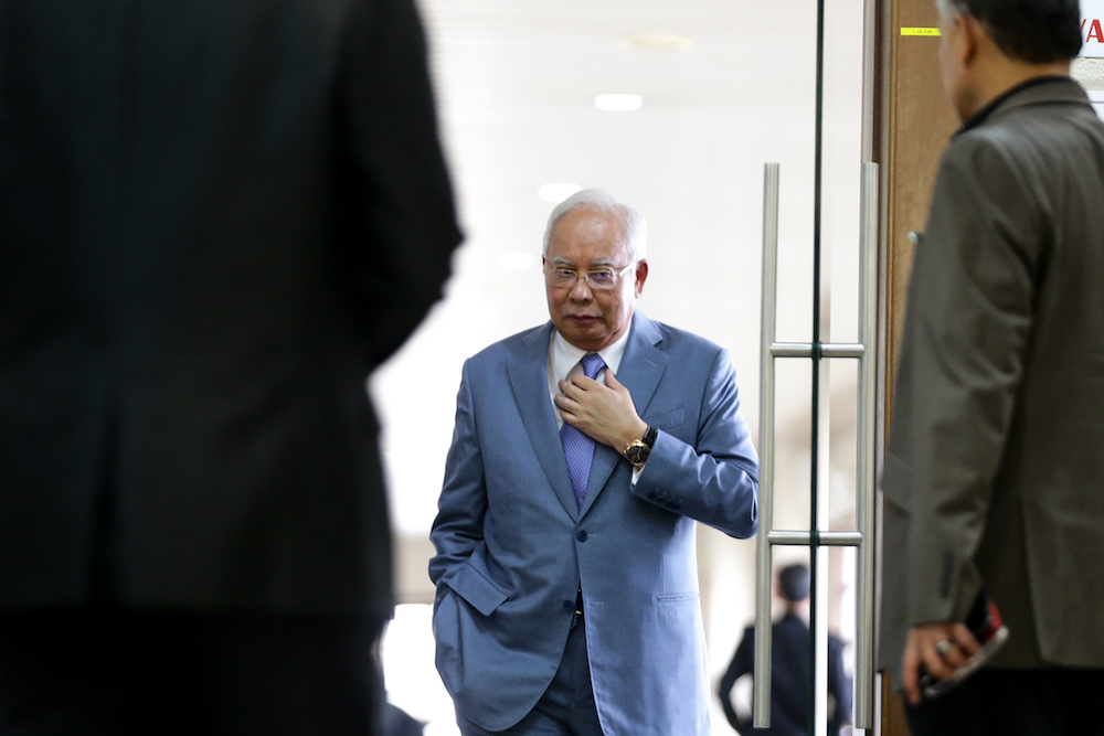 Datuk Seri Najib Razak is seen at the Kuala Lumpur Courts Complex July 18, 2019. u00e2u20acu201d Picture by Ahmad Zamzahuri