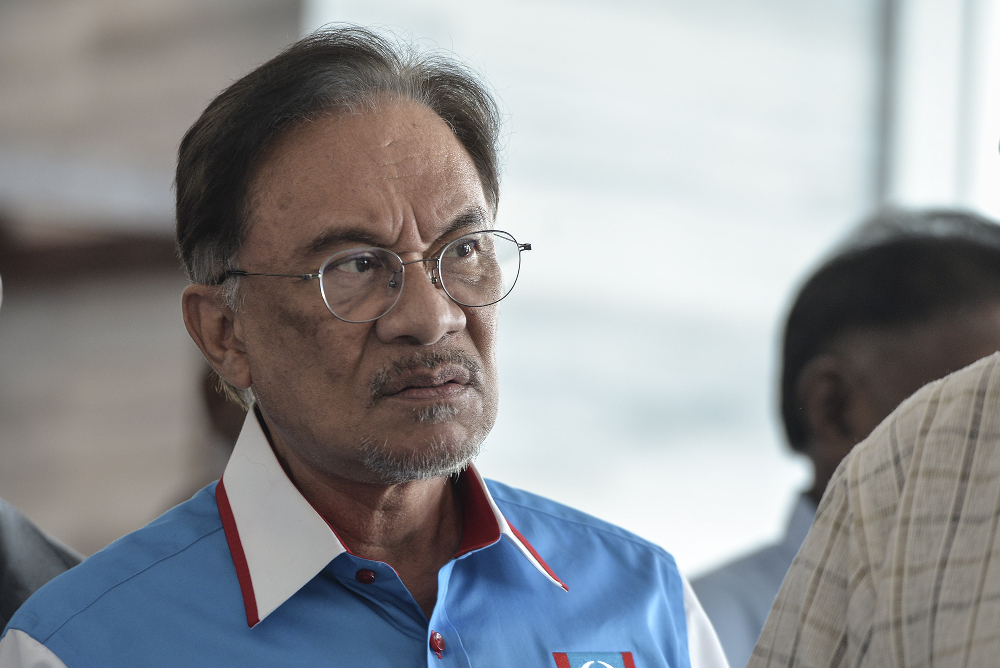 PKR president Datuk Seri Anwar Ibrahim speaks to the media during PKRu00e2u20acu2122s retreat at the Lexis Hibiscus resort in Port Dickson July 20, 2019. u00e2u20acu201d Picture by Shafwan Zaidon