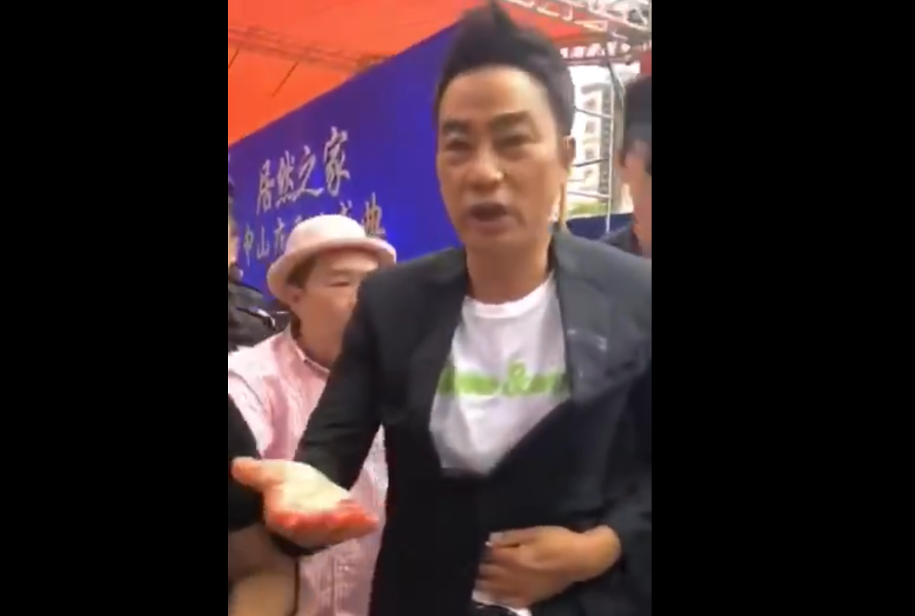 Hong Kong actor Simon Yam was stabbed in the abdomen this morning while attending a promotional event in southern China. u00e2u20acu201d Screengrab via Weibo