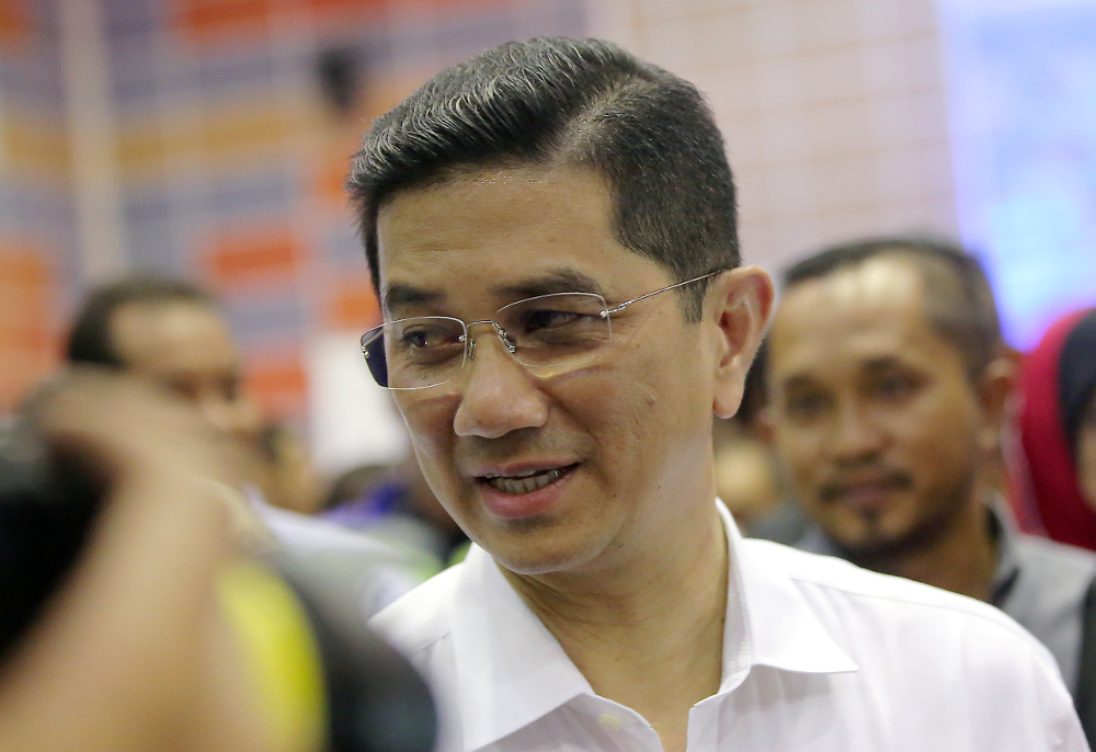 Economic Affairs Minister Datuk Seri Azmin Ali speaks to the press after visiting Felcra residents at the Dewan Besar Seberang Perak, Kampung Gajah July 22, 2019. u00e2u20acu201d Picture by Farhan Najib