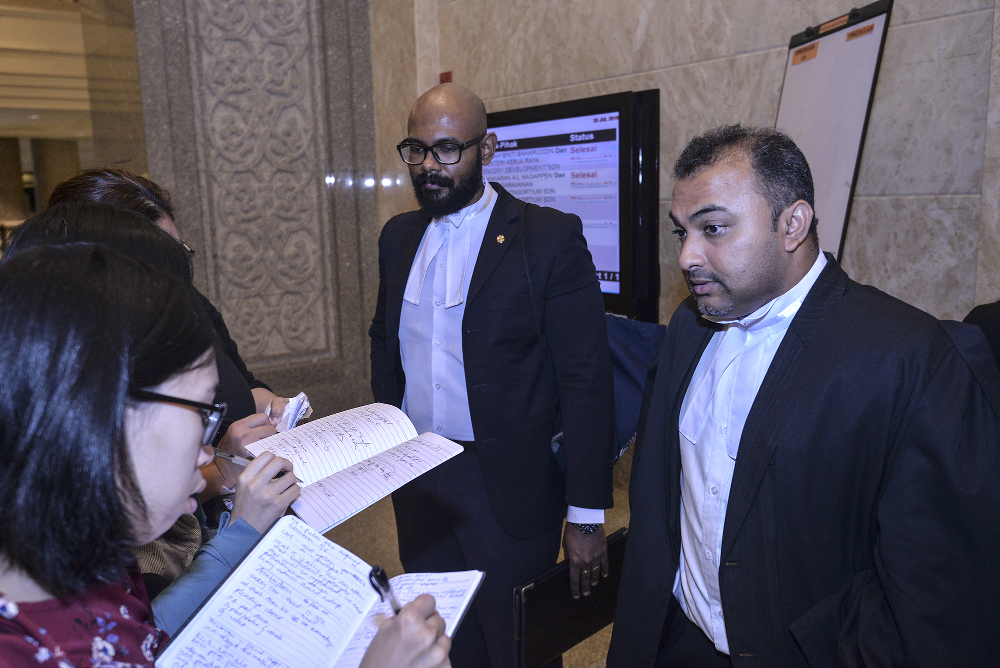 Lawyers Balan Nair Thamodaran and Gavin Jay Anand Jayapal speaks to the reporters after the hearing of appeal against the High Court’s decision to reject U-Thant residents’ JR challenge against SPE highway in Putrajaya, July 25, 2019. — Picture by S