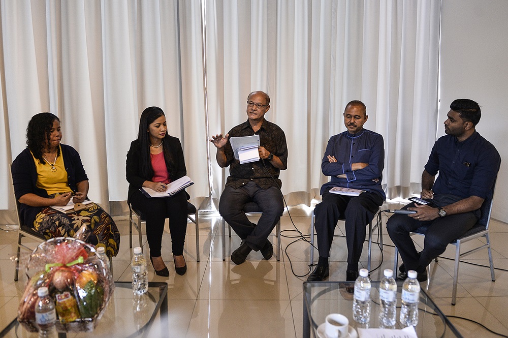 (From left) co-founder of Orang Asli Community Learning Centre Jenita Engi, University of Nottingham associate professor Suria Selasih Angit, Jakoa director general Professor Juli Edo and Samuel Isaiah