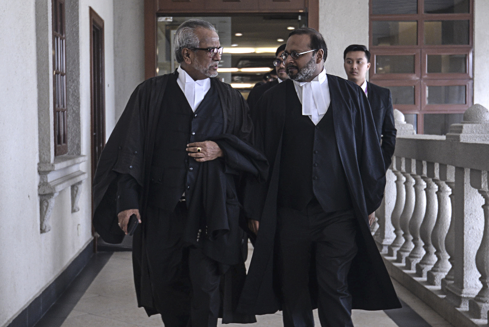 Tan Sri Shafee Abdullah and his lawyer David Thomas Mathews are seen at the Kuala Lumpur High Court July 31, 2019. u00e2u20acu201d Picture by Shafwan Zaidon