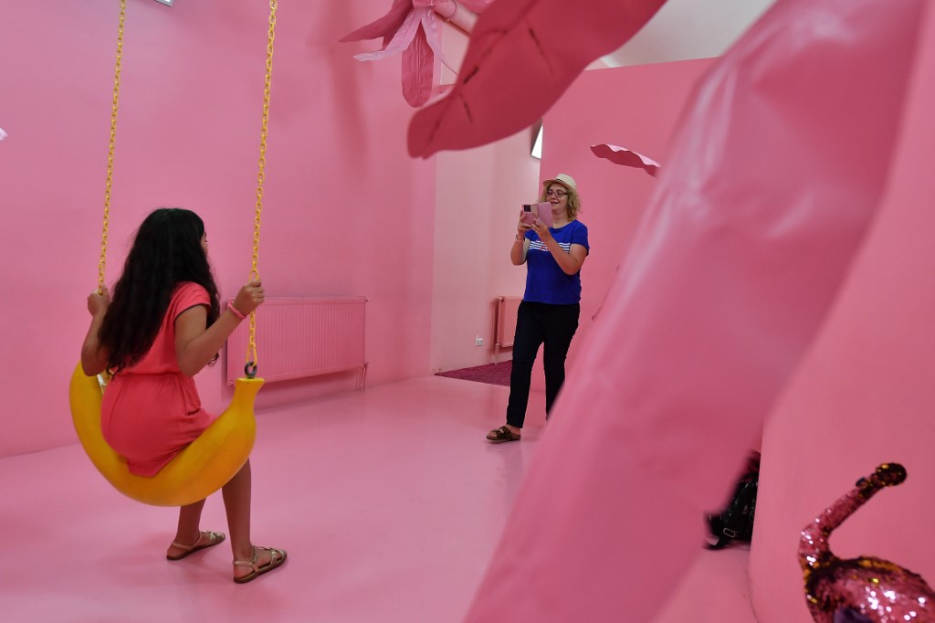 Young visitors make photos at the 'Selfie Museum' in Budapest downtown on July 17, 2019. The newest attraction in the Hungarian capital opened this year in a two-level 400m2 area. u00e2u20acu201d AFP picnn