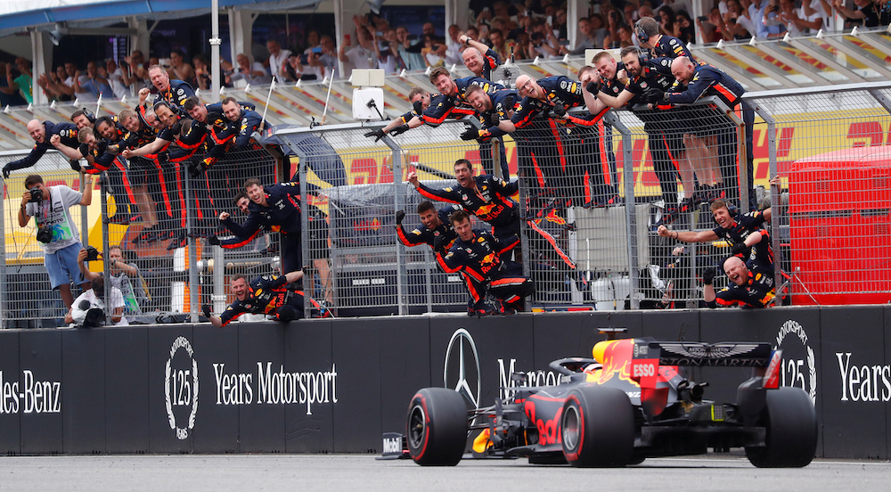 Red Bull's Max Verstappen crosses the line to win the race as Red Bull engineers celebrate, Hockenheim July 28, 2019. u00e2u20acu201d Reuters pic 
