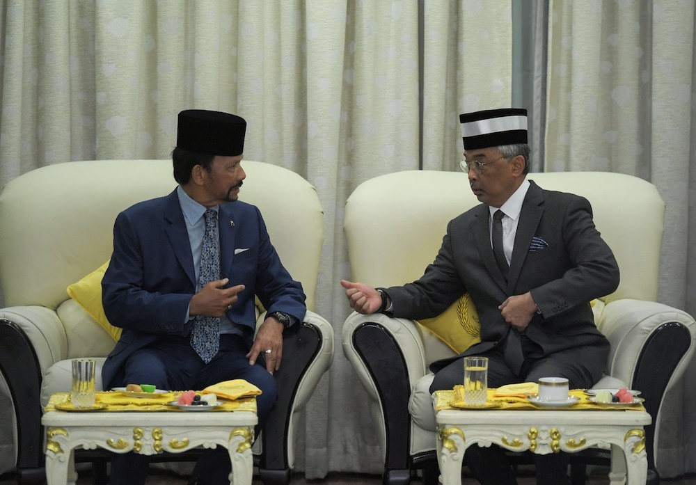Yang di-Pertuan Agong Al-Sultan Abdullah Ri'ayatuddin Al-Mustafa Billah Shah seen with the Sultan of Brunei Darussalam, Sultan Hassanal Bolkiah at Subang July 29, 2019. u00e2u20acu201d Bernama pic