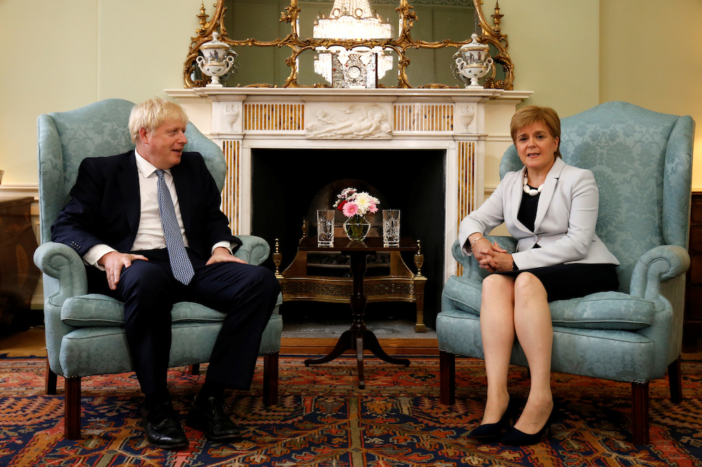 Britain's Prime Minister Boris Johnson poses for a photograph with Scotland's First Minister Nicola Sturgeon at Bute House in Edinburgh July 29, 2019. u00e2u20acu201d Duncan McGlynn/Pool via Reuters