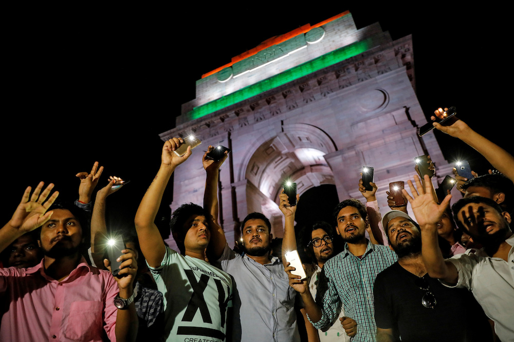 People take part in a protest demanding investigation in a highway collision in which a woman who is fighting a rape case against a legislator of the ruling BJP was critically injured, New Delhi July 29, 2019. u00e2u20acu201d Reuters pic