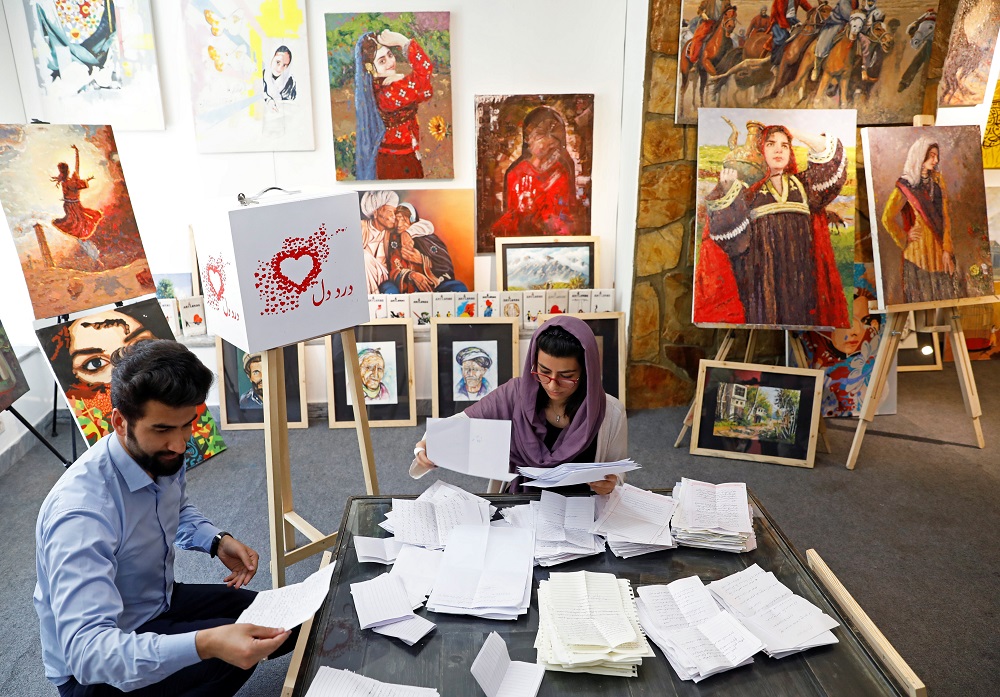 Members of the ArtLords sort letters of Dard-e-Dil (a painful heart) project in Kabul, Afghanistan July 6, 2019. u00e2u20acu201d Reuters pic 