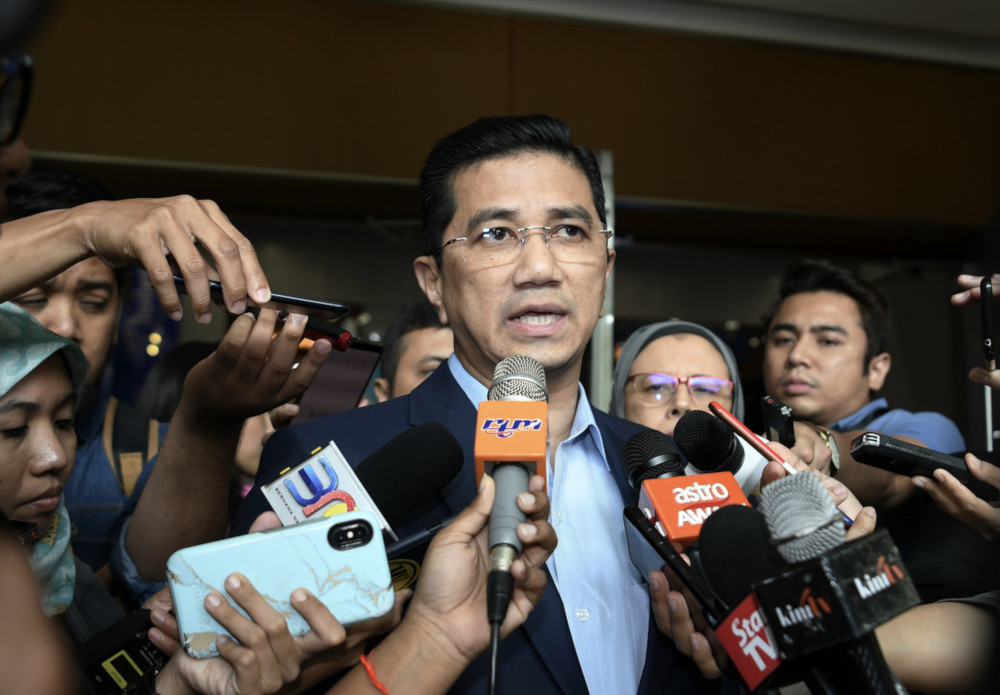 Economic Affairs Minister Datuk Seri Mohamed Azmin Ali speaks to the media after launching the Graduan Aspire Career Fair at the Kuala Lumpur Convention Centre July 13, 2019. u00e2u20acu201d Bernama pic 