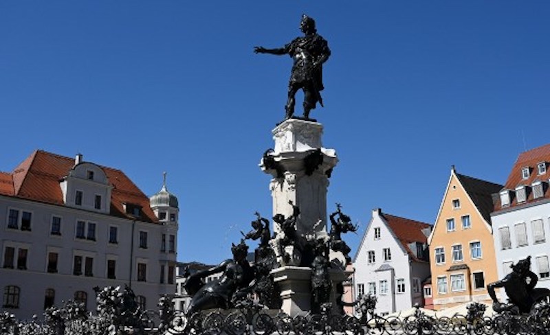 A picture taken on July 4, 2019, shows the City Hall Squareu00e2u20acu2122s fountain with its bronze sculpture featuring the cityu00e2u20acu2122s founder, Caesar Augustus, in the city of Augsburg, southern Germany. u00e2u20acu201d AFP pic