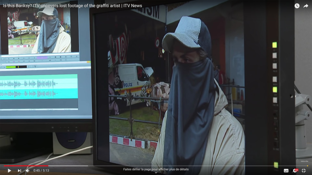 A long-lost report by ITV News features an anonymous man believed to be Banksy. u00e2u20acu201d Picture from ITV News/Youtube.com via AFP-Relaxnews