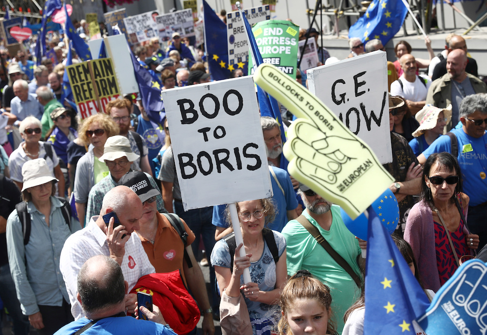 Anti-Brexit protesters hold banners during an anti-Brexit u00e2u20acu02dcNo to Boris, Yes to Europeu00e2u20acu2122 march in London, Britain July 20,2019. u00e2u20acu201d Reuters picnnn