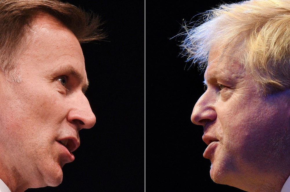 A combination of pictures created in London on July 19, 2019 shows the two British Conservative Party leadership candidates Boris Johnson (right) and Jeremy Hunt.  u00e2u20acu201d AFP pic          
