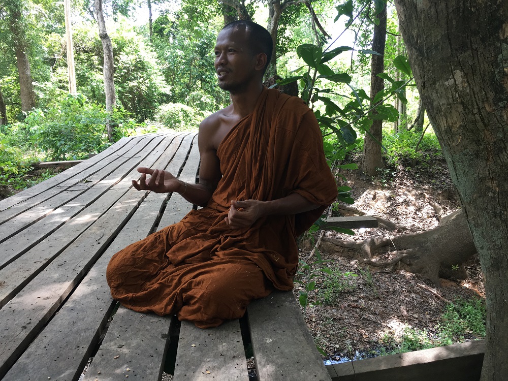 Khoeum Saray, a Buddhist monk who helps manage Monku00e2u20acu2122s Community Forest, which is managed by Buddhist monks and villagers in Anlong Veng in Oddar Meanchey province in northwest Cambodia May 29, 2019. u00e2u20acu201d Thomson Reuters Foundation pic