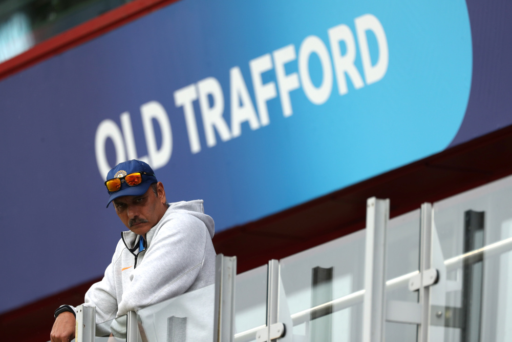 India coach Ravi Shastri looks on during the rain delay at the ICC Cricket World Cup semi final match between India and New Zealand at Old Trafford, Manchester, Britain July 9, 2019. u00e2u20acu201d Action Images via Reuters