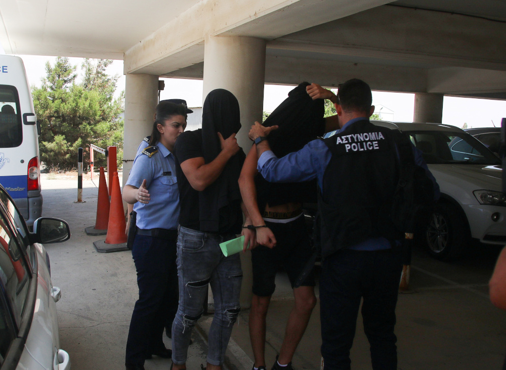 Israeli tourists, arrested over the alleged rape of a British tourist in the resort town of Ayia Napa, arrive to appear before a magistrate for a remand hearing in the Famagusta courthouse in Paralimni, Cyprus July 18, 2019. u00e2u20acu201d Reuters pic 
