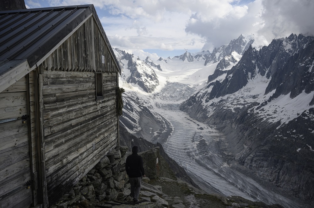 Sarah Cartier, guardian of the Charpoua refuge on the Charpoua Glacier, walks near the refuge in Chamonix-Mont-Blanc June 19, 2019. u00e2u20acu201d AFP pic
