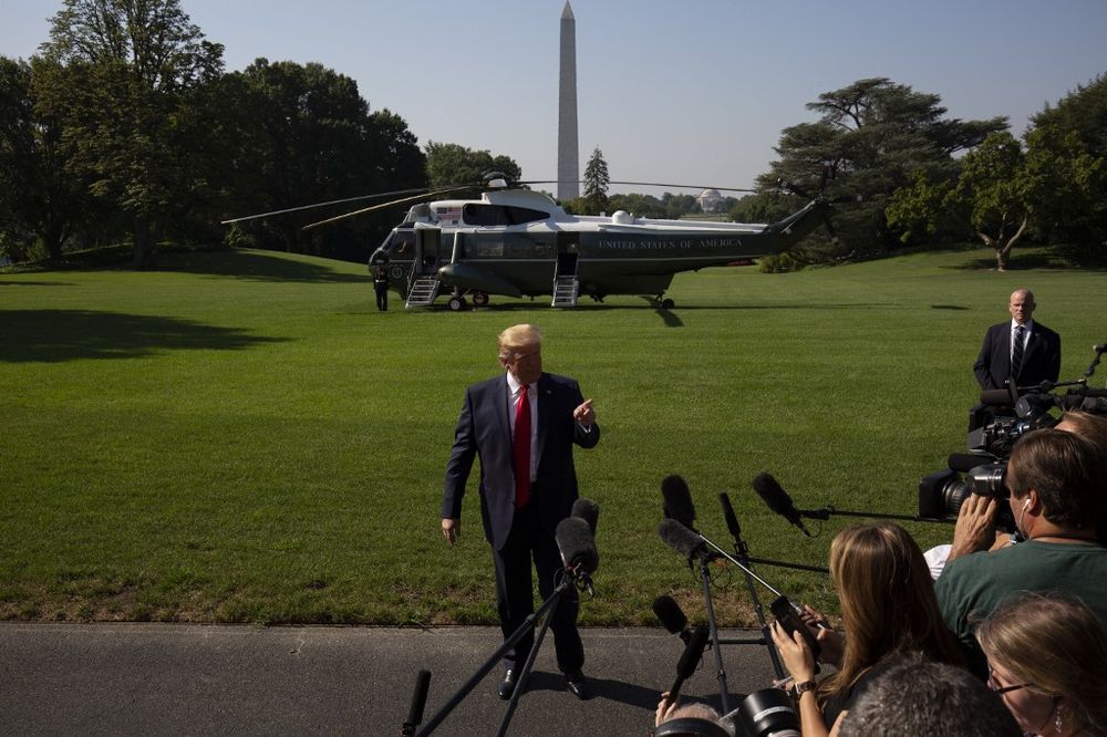 US President Donald Trump speaks to the media prior to departing from the South Lawn of the White House in Washington, DC, July 30, 2019, as he travels to the 400th anniversary of Jamestown. u00e2u20acu201d AFP pic