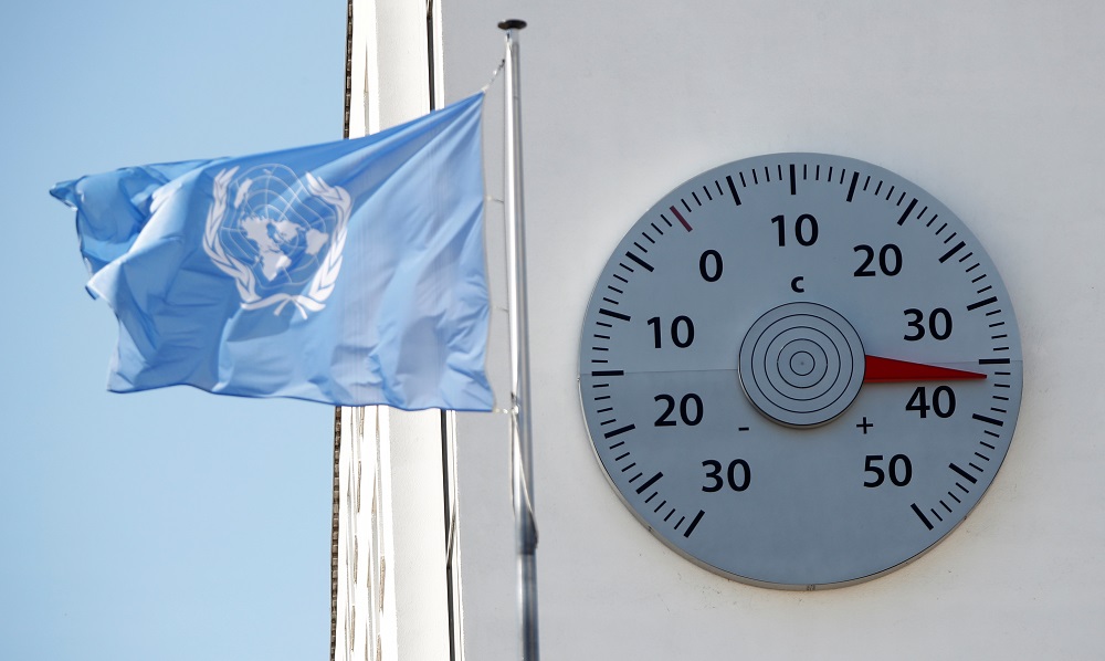 The flag of the United Nations flutters next to a huge thermometer showing more than 36 degrees Celsius, mounted to a wall of the headquarters of the United Nations Framework Convention on Climate Change in Bonn, Germany July 23, 2019. u00e2u20acu201d Reuters pic