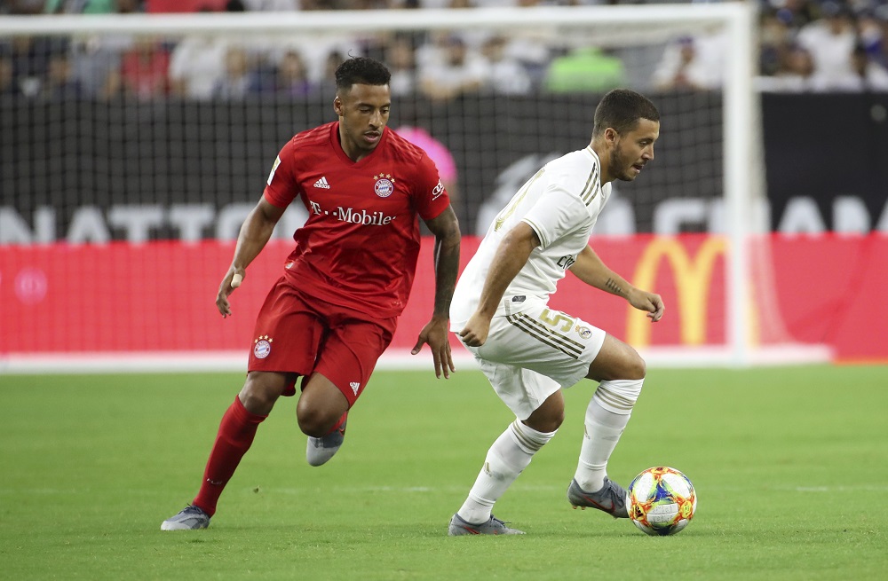 Real Madrid forward Eden Hazard (right) controls the ball as Bayern Munich midfielder Corentin Tolisso chases during the International Champions Cup football series at the NRG Stadium in Houston July 20, 2019. u00e2u20acu201d Kevin Jairaj/USA TODAY Sports/Reuters pic
