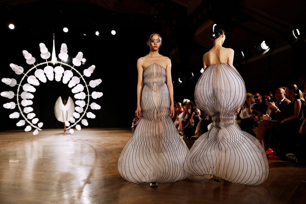 Models present creations by Iris van Herpen during the Women’s Fall-Winter 2019/2020 Haute Couture collection fashion show in Paris July 1, 2019. — AFP pic