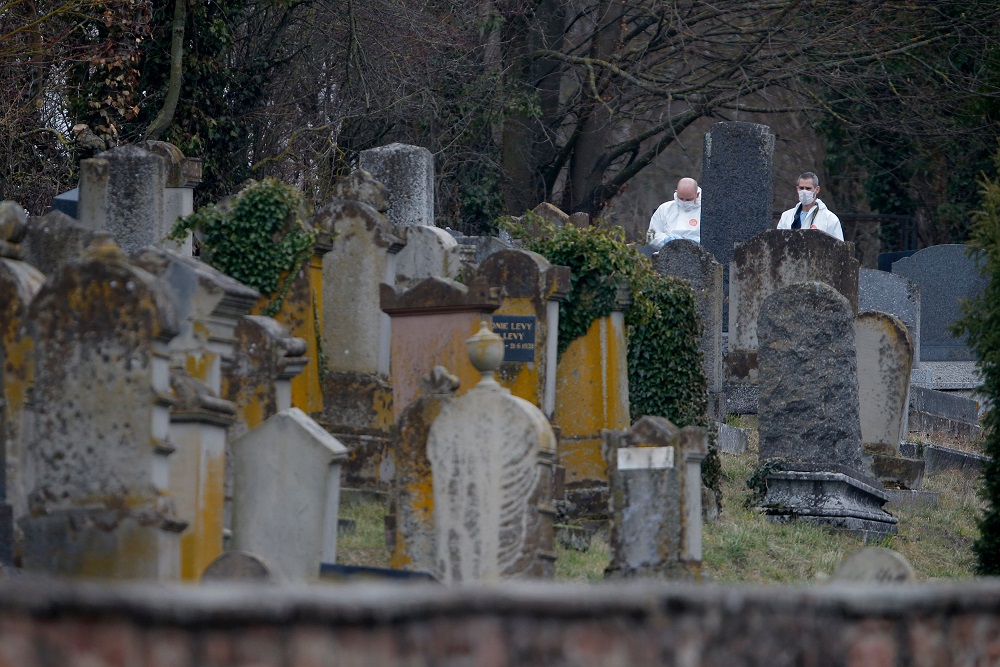 French gendarmes conduct their investigation as they examine graves that were desecrated with swastikas in the Jewish cemetery in Quatzenheim, near Strasbourg, France, February 19, 2019. u00e2u20acu201d Reuters pic