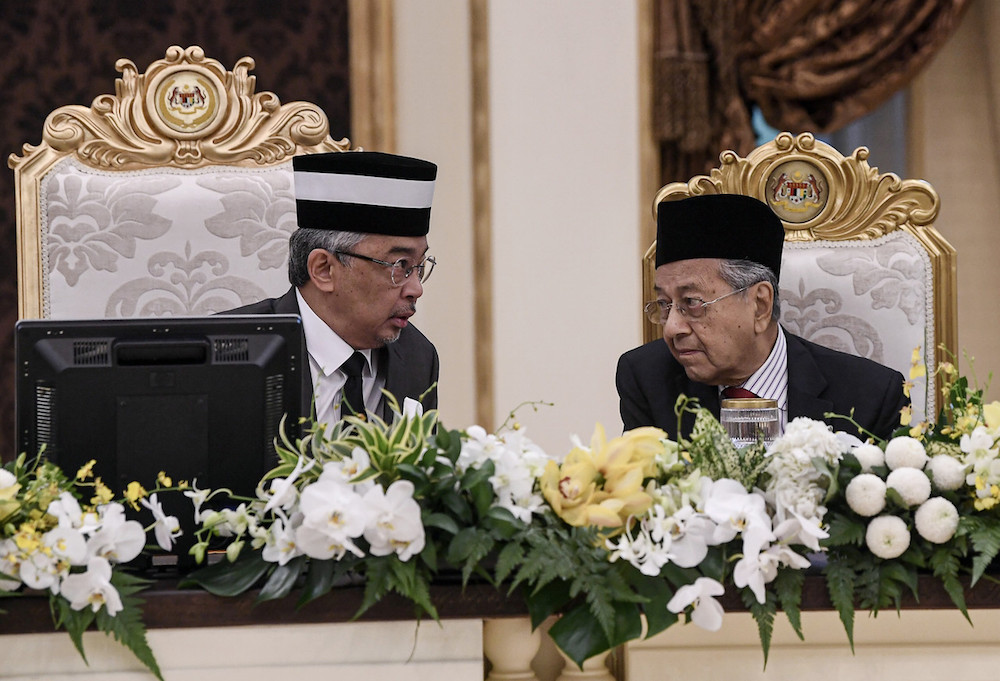 Yang di-Pertuan Agong Al-Sultan Abdullah Riu00e2u20acu2122ayatuddin Al-Mustafa Billah Shah berbincang and Prime Minister Tun Dr Mahathir Mohamad attend the 254th meeting of the Conference of Rulers at Istana Negara in Kuala Lumpur July 4, 2019. u00e2u20acu201d Bernama pic
