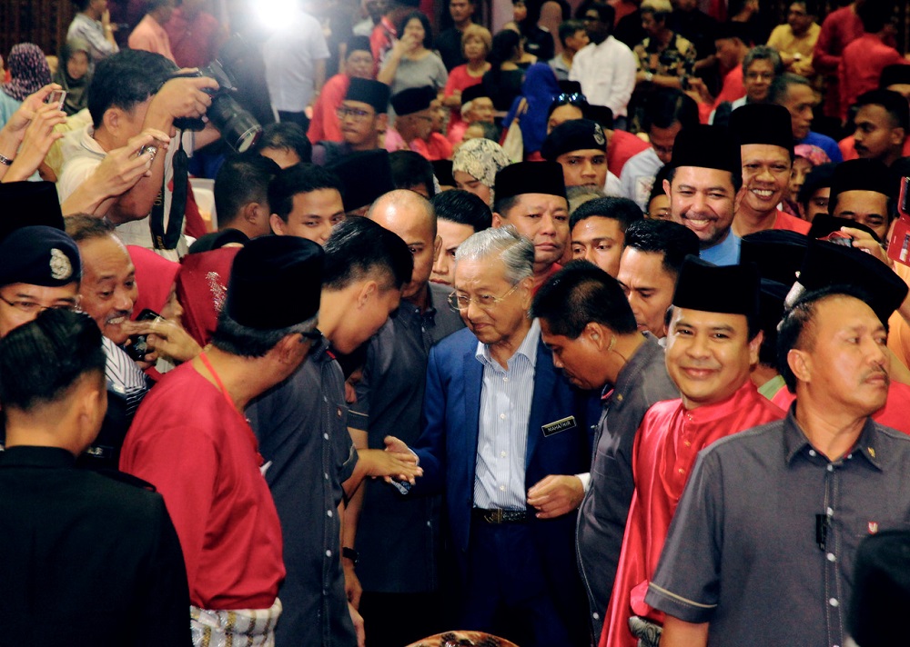 Prime Minister Tun Dr Mahathir Mohamad (centre) at the Johor Bersatu Aidilfitri Open House gathering in Johor Baru July 5, 2019. u00e2u20acu201d Bernama pic