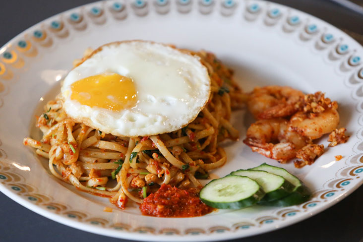 The eatery serves a pasta 'goreng', their version of 'mee goreng' with garlicky prawns and fried egg