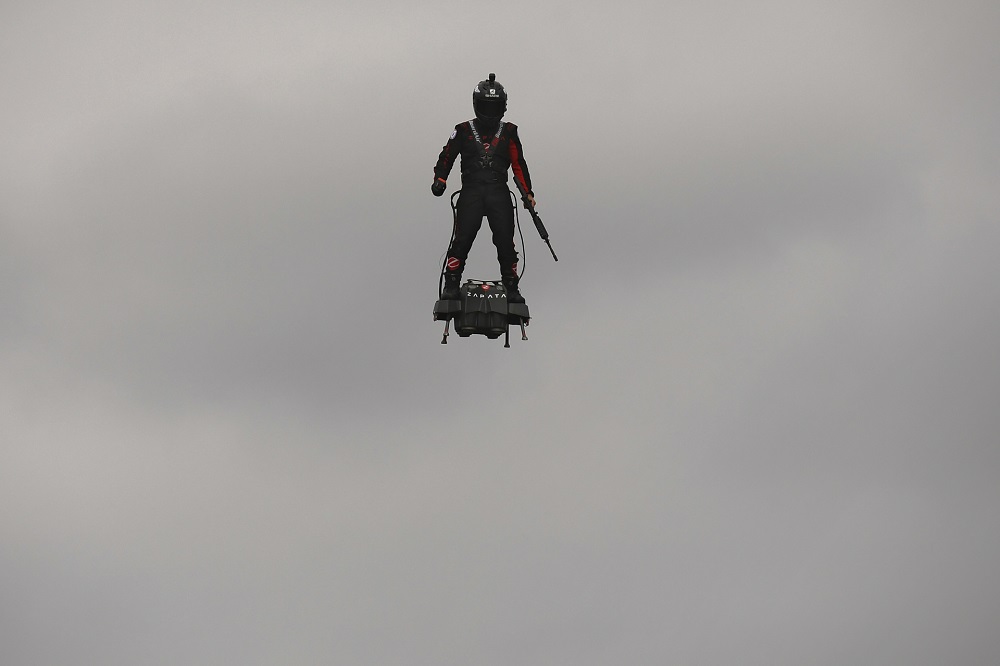 Zapata CEO Franky Zapata flies a jet-powered hoverboard or u00e2u20acu02dcFlyboardu00e2u20acu2122 prior to the Bastille Day military parade in Paris July 14, 2019. u00e2u20acu201d AFP pic       