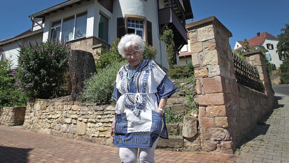 Lisel Heise, 100 years of age and member of the town council poses in front of her house in the southwestern German city of Kirchheimbolanden July 4, 2019. u00e2u20acu201d AFP pic        