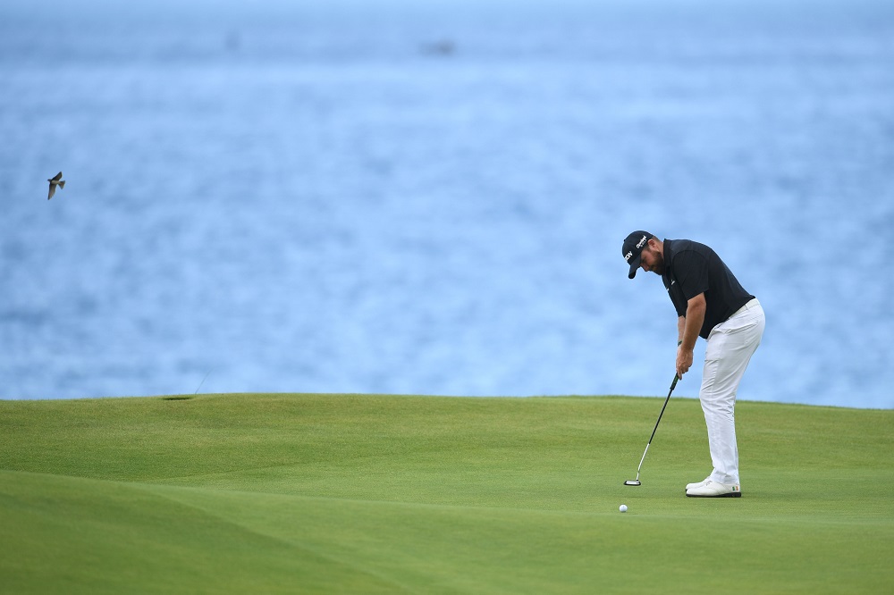 Irelandu00e2u20acu2122s Shane Lowry putts at the 5th green during the third round of the British Open golf Championships at Royal Portrush golf club in Northern Ireland July 20, 2019. u00e2u20acu201d AFP pic          