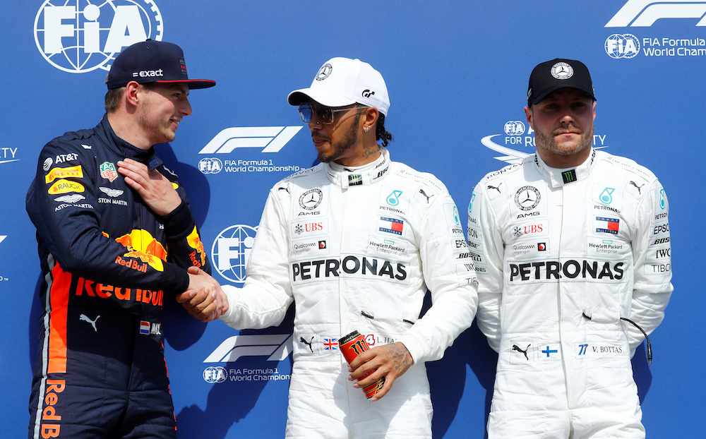 Red Bullu00e2u20acu2122s Max Verstappen who qualified in second position, Mercedesu00e2u20acu2122 Lewis Hamilton who qualified in pole position and Mercedesu00e2u20acu2122 Valtteri Bottas who qualified in third position on the podium after qualifying at the German Grand Prix in Hockenheimri