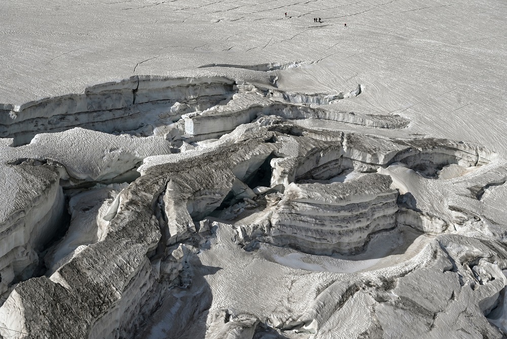 Climbers walk next to wide crevasses on the u00e2u20acu02dcGlacier du Geantu00e2u20acu2122 (Giant glacier), on July 20, 2019 in the Mont Blanc range, near the Chamonix valley, in the French Alps, eastern France. u00e2u20acu201d AFP pic      