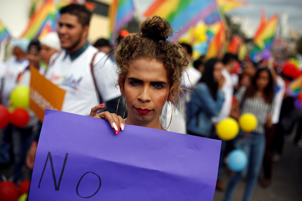 A participant holds a placard during a march to mark the International Day Against Homophobia, Transphobia and Biphobia in Tegucigalpa, Honduras May 17, 2018. u00e2u20acu201d Reuters pic