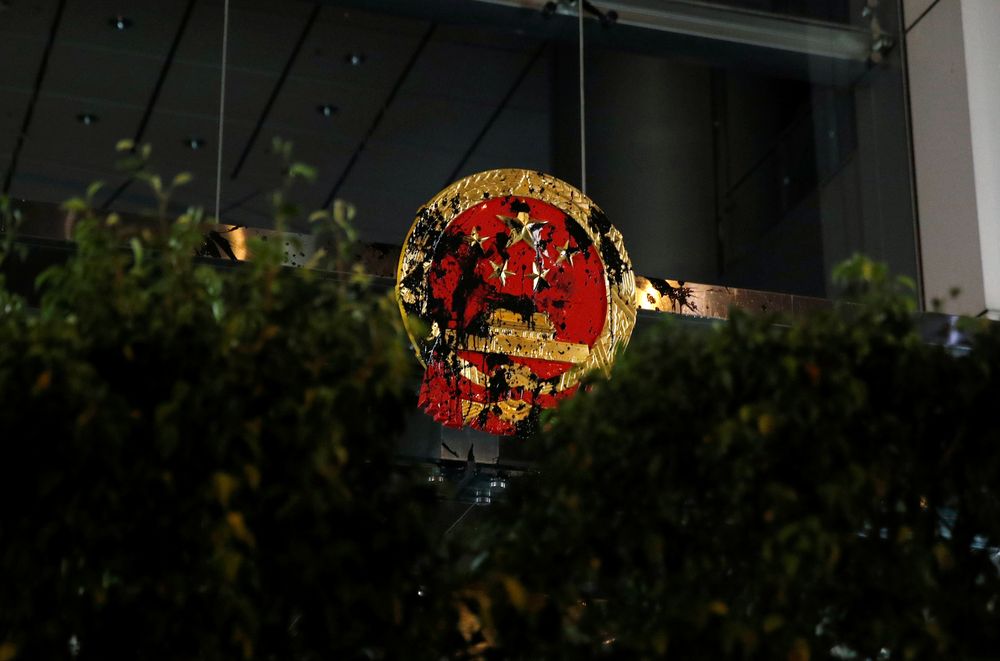 A National Emblem of the People's Republic of China is seen vandalised on Chinese Liaison Office after a march to call for democratic reforms, in Hong Kong, China July 21, 2019. —Reuters pic