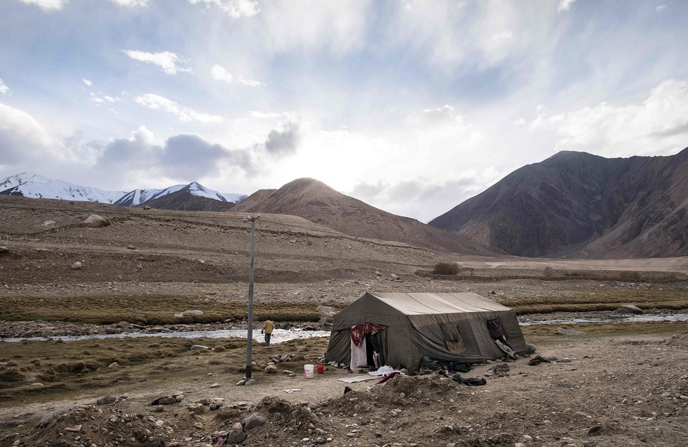 In this picture taken on May 16, 2019, a general view shows the campsite of road maintenance workers from India's low-lying eastern Jharkhand state, near Tangtse village in northern India's Ladakh region of Jammu and Kashmir state. ― AFP pic        