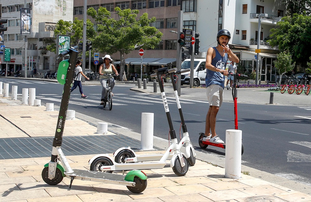 A man rides an electric scooter in the streets of the Israeli coastal town of Tel Aviv May 30, 2019. u00e2u20acu201d AFP pic        
