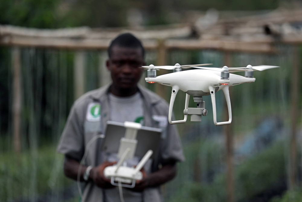 A member of the Ivorian Investiv Group startup, take off a drone at a tomatoes farm in northern Abidjan, Ivory Coast April 26, 2019. u00e2u20acu201d Reuters pic       