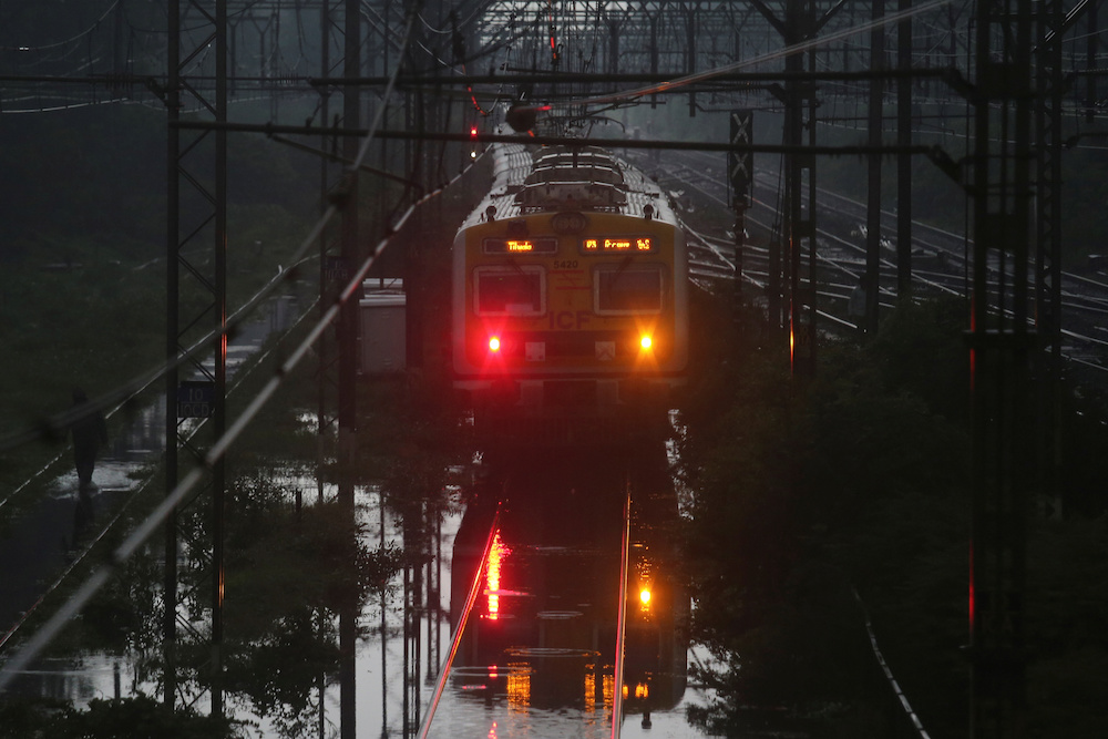 File photo of a suburban train stalling due to flooded railway tracks during heavy monsoon rains in Mumbai, India, July 2, 2019. u00e2u20acu201d Reuters pic