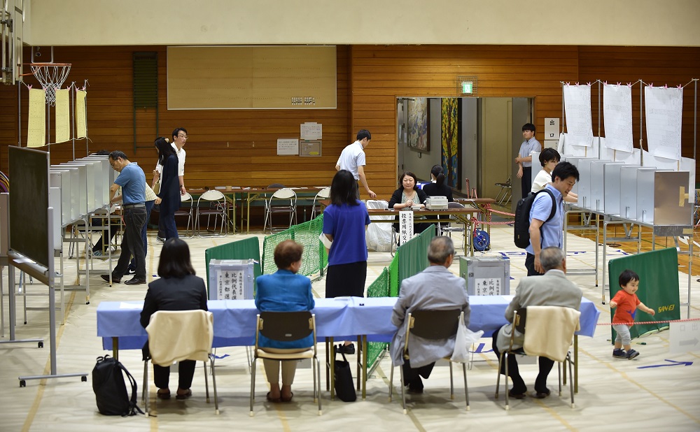 Voters cast their vote for Parliamentu00e2u20acu2122s upper house election at a polling station in Tokyo July 21, 2019. u00e2u20acu201d AFP pic          