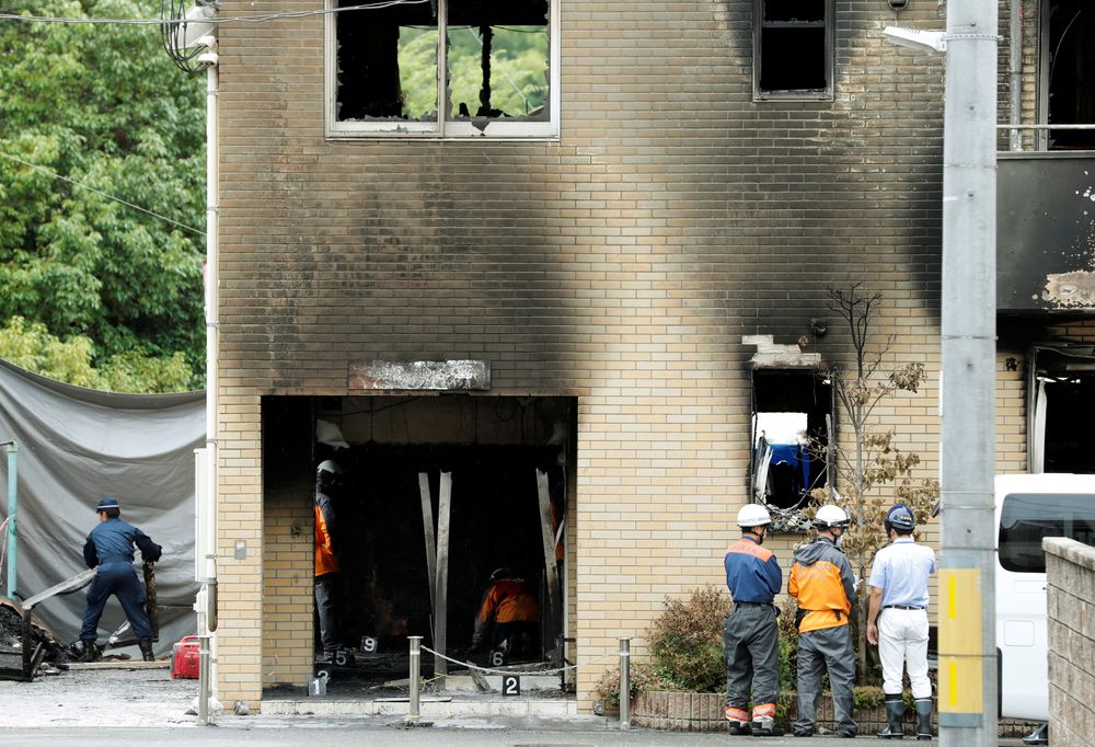 Firefighters work at the Kyoto Animation building which was torched by arson attack, in Kyoto, Japan, July 19, 2019. — Reuters pic