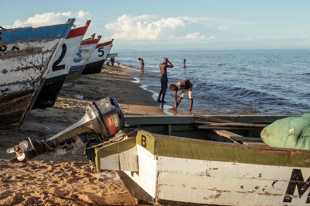 Malawian fishermen wash themselves with the water from the lake on the shore of the Lake Malawi at the Senga village in Senga, Malawi May 19, 2019. u00e2u20acu201d AFP pic        