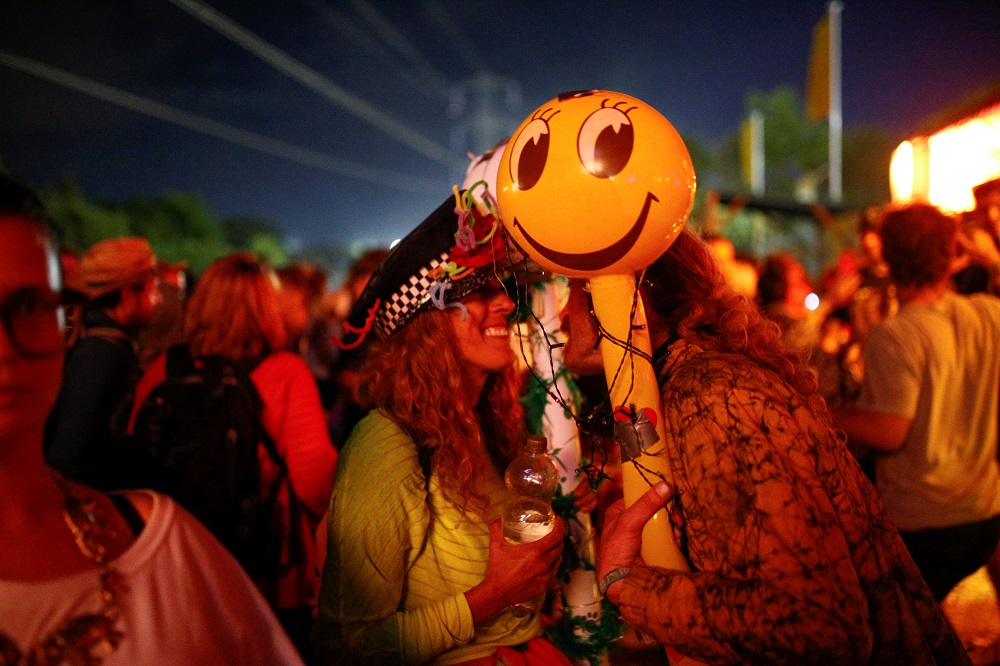 Festival goers dance in the early hours of the morning during Glastonbury Festival in Somerset, Britain July 1, 2019. u00e2u20acu201d Reuters pic      