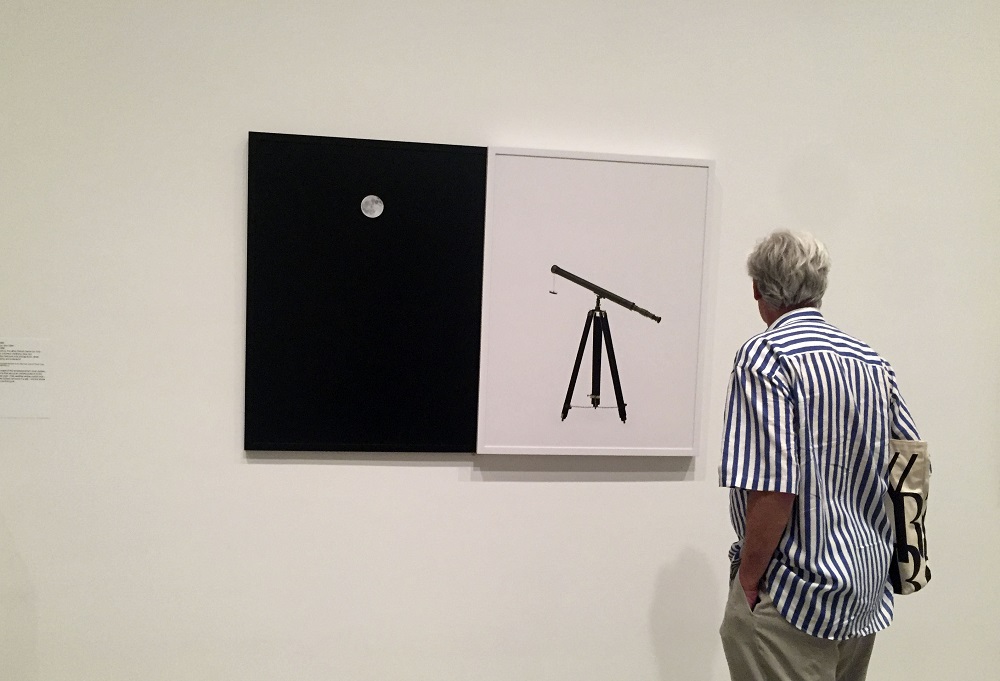A man looks at u00e2u20acu02dcAtlas Photographique de la luneu00e2u20acu2122 by Maurice Loewy and Pierre Henri Puiseux on July 1, 2019, part of the Metropolitan Museum of Art in New Yorku00e2u20acu2122s u00e2u20acu02dcApollou00e2u20acu2122s Muse: The Moon in the Age of Photographyu00e2u20acu2122 exhibition. u00e2u20acu201d AFP pic